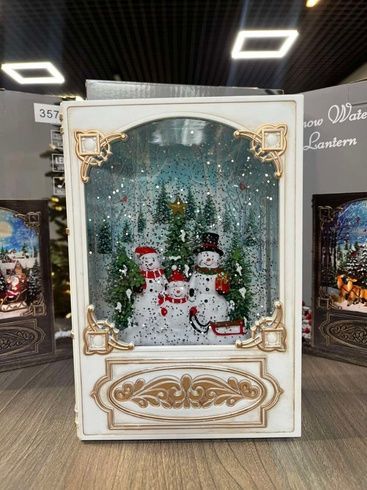 Музыкальная новогодняя книга ночник-светильник XMAS WDL 24023B  Снеговик