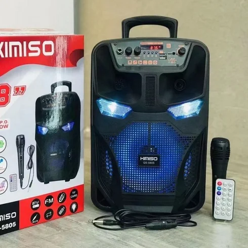 Легкая и функциональная колонка-чемодан Kimiso QS-5805 с микрофоном (USB/BT/FM). - Купить товари для дома в интернет-магазине leo-shop